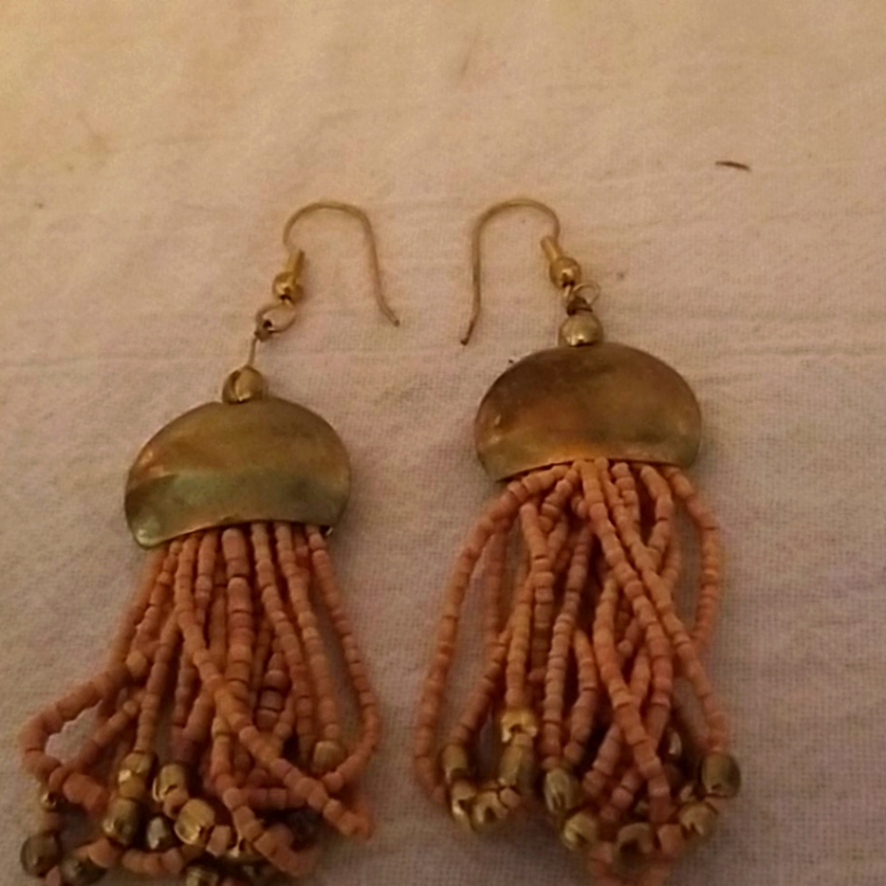 I think they are little wood beads